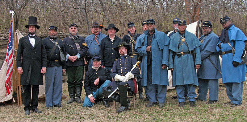 Members of the Thirteenth Living History Association with President Lincoln
