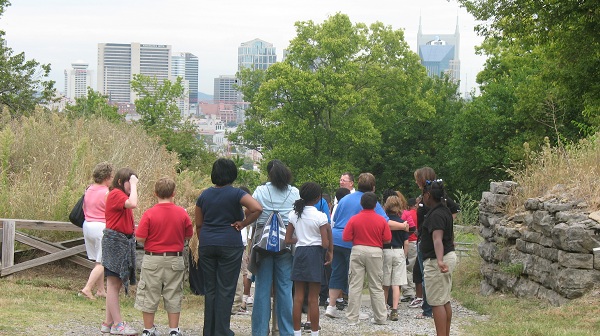 Paul Smith, Museum Operations Specialist at Fort Negley, leads a group of school children on a tour of the fort.
