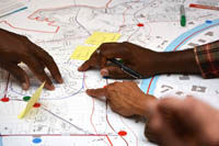 photo of hands on map