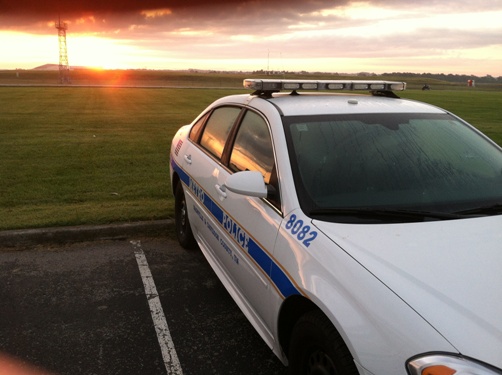 police car at sunrise