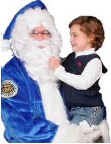 santa in blue suit holding child