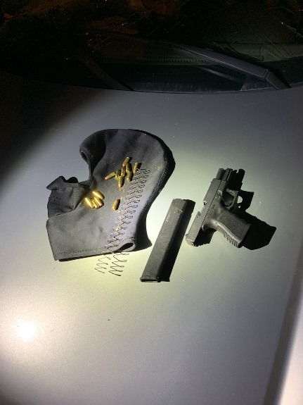 Gun and Ski Mask