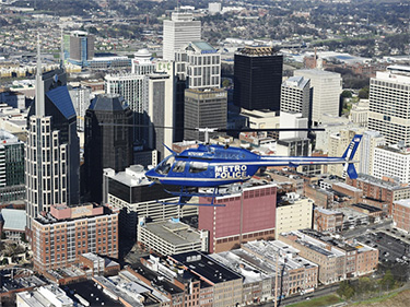 Aerial view of downtown Nashville and Police helicopter